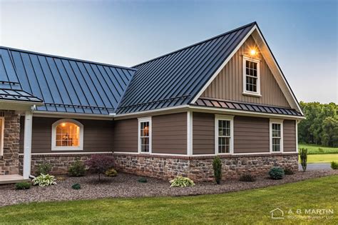 dark gray house with metal roof|gray homes with black roofs.